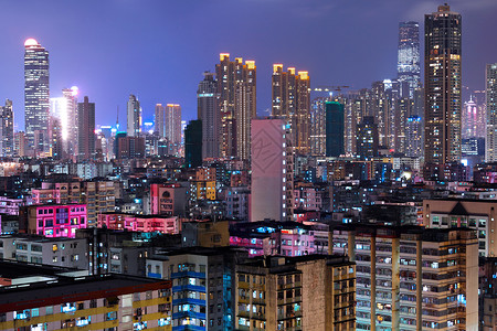 香港人口拥挤的城市摩天大楼旅游游客工作景观商业玻璃办公室日落天空镇高清图片素材