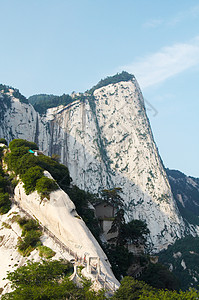 中国习安华山圣山岩石旅游楼梯爬坡旅行远足天空脚步悬崖宗教背景图片