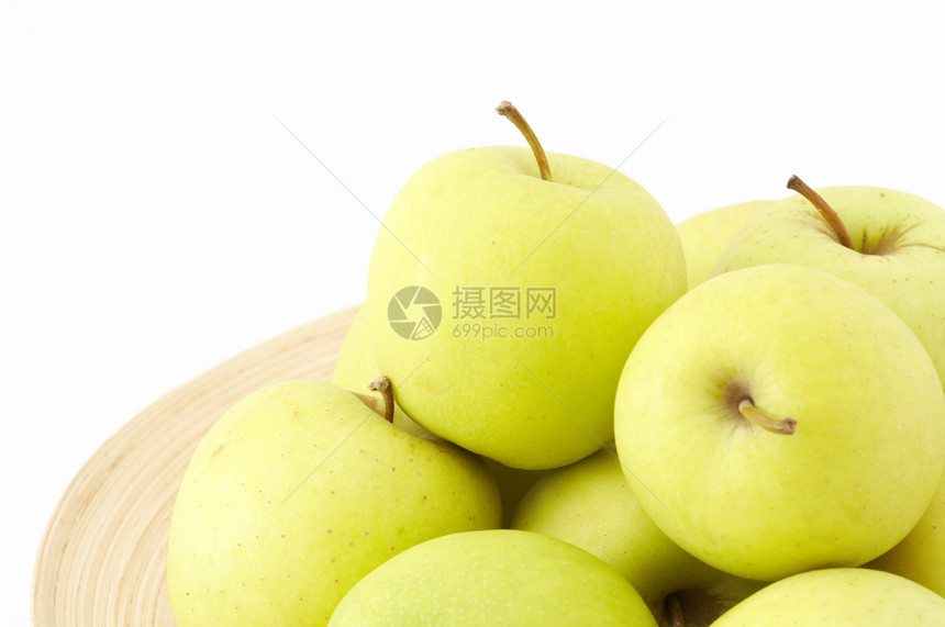 木板上的绿苹果堆水果小吃篮子黄色白色食品盘子绿色饮食团体图片