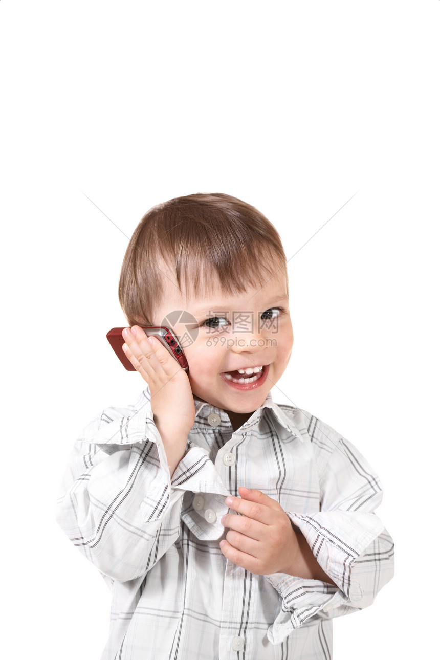 带有移动电话的婴儿儿子儿童乐趣微笑快乐白色男生商业呼唤童年图片