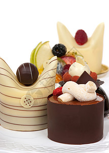 Gourmet 甜食盘子巧克力可可食物奶油水果蛋糕装饰美食覆盆子背景图片