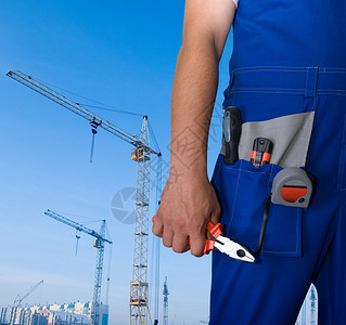 修理工工作安全工具塑料男性建设者工人金属衣服起重机塔高清图片素材