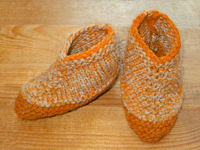手工编织婴儿鞋婴儿短靴拖鞋袜子背景图片