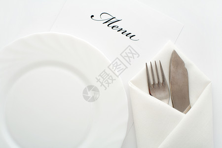 餐馆金属餐具奢华财富厨房食物桌子白色银器菜单背景图片