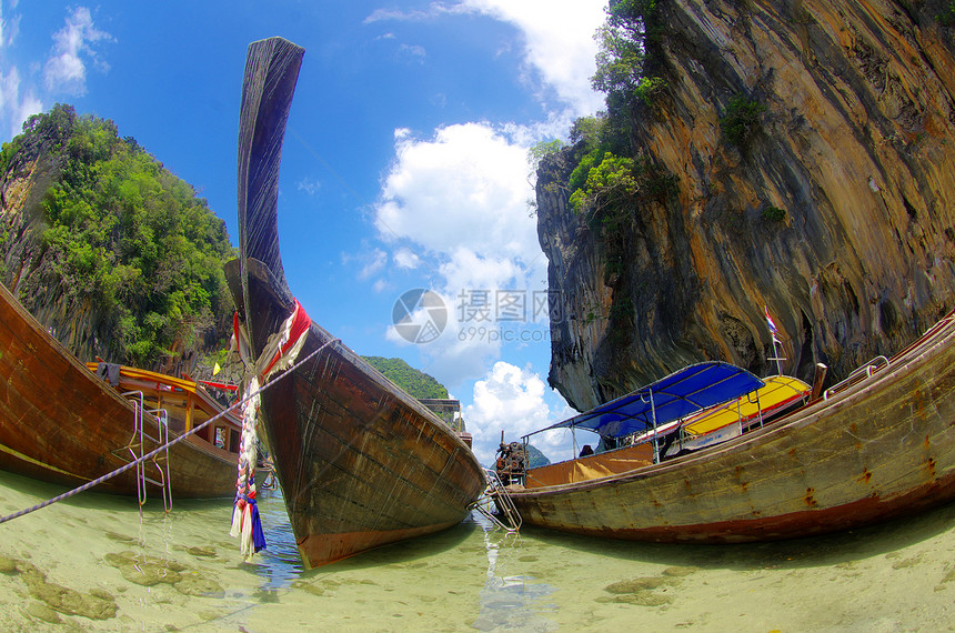 船只和岛屿天空假期旅行悬崖风景海滩运输热带尾巴海洋图片