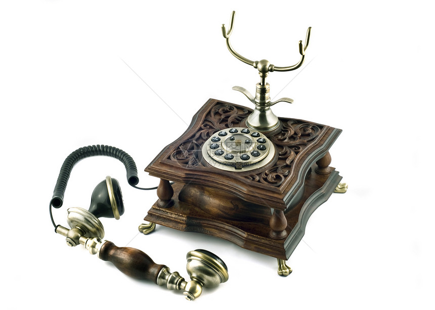 旧式电话数字听者白色时间旋转古董电讯棕色技术手机图片