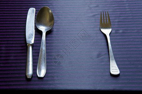 Retro 金属餐桌式餐具礼仪勺叉刀背景图片
