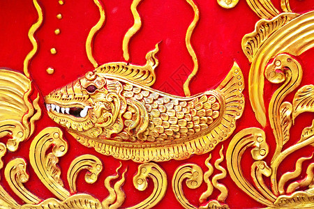 墙上土生土生土长的Thai风格的黄金图科设计传统喷雾剂装饰品石膏装饰艺术工艺浮雕雕刻手工背景图片