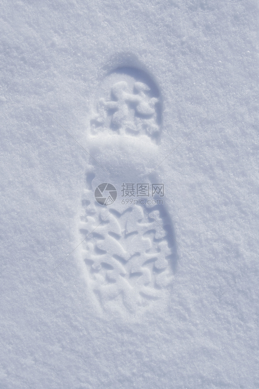 雪雪中的靴脚足足迹图片