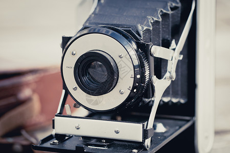 折叠相机摄影怀旧电影技术快门照片背景图片