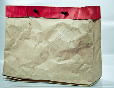 回收袋全球环境纸袋摄影水平回收红色背景图片