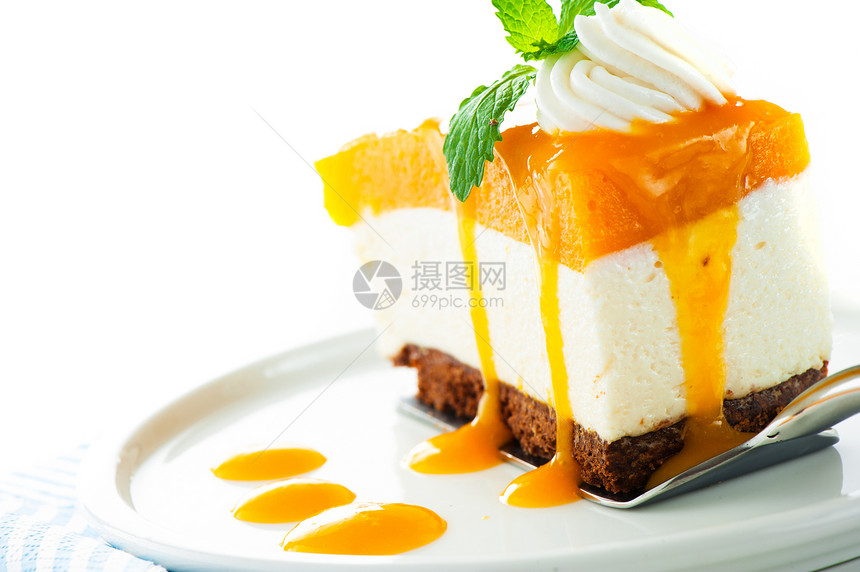 一个芒果奶酪蛋糕 白色背景的芒果芝士蛋糕 作为工作室sho蛋糕奇异果奶油食谱诱惑面粉黄油橙子糖果糕点图片