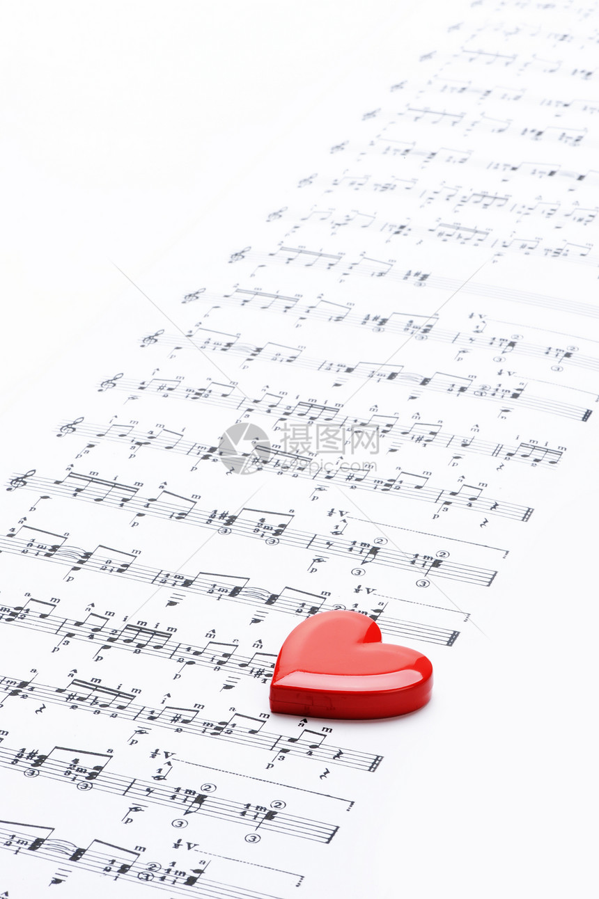 我爱音乐 带心的乐谱文化文档红色艺术唱歌风格宏观音符条纹符号图片