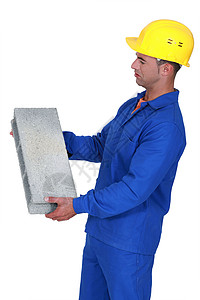 用混凝土块构建器水泥承包商石匠衣领建造头盔商业瓦工不动产房子砖高清图片素材