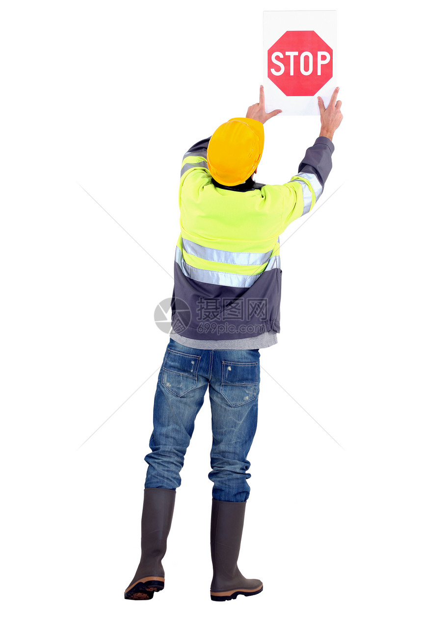 有停车标志的工人橙子男人衣领权威民众警告衣服驾驶安全运输图片