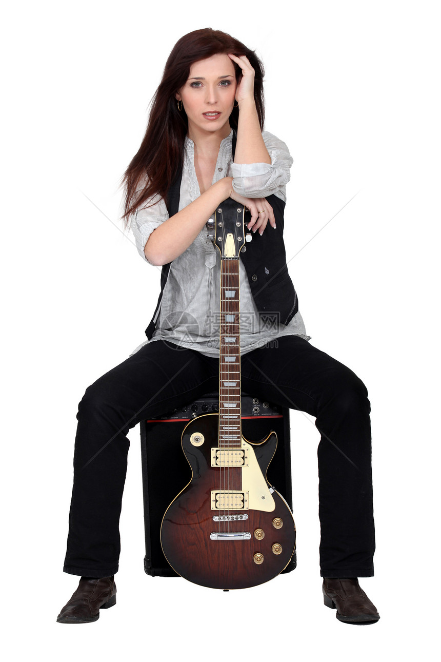 带电吉他迷人的黑发美女图片
