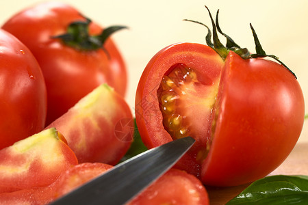 环球番茄切开水果食物水平照片蔬菜刀刃红色种子圆形背景图片