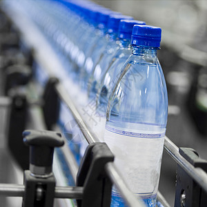 瓶装工业瓶子自动化制造业矿物蓝色生产线技术塑料输送带机器水高清图片素材