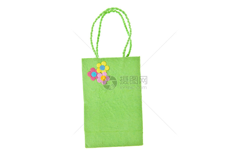 在白色背景上隔离的绿色木莓纸袋粉色棕色蓝色商品礼物材料购物黄色零售回收图片
