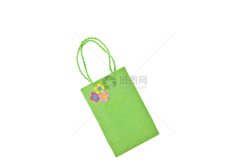 在白色背景上隔离的蓝毛莓纸袋棕色蓝色黄色绿色回收材料零售商品礼物购物图片