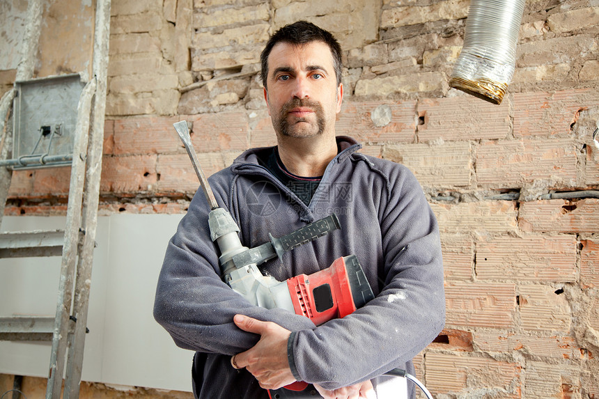 爆破锤铁人泥石匠手工工人男性维修房子机器工作承包商工具男人梯子胡子图片