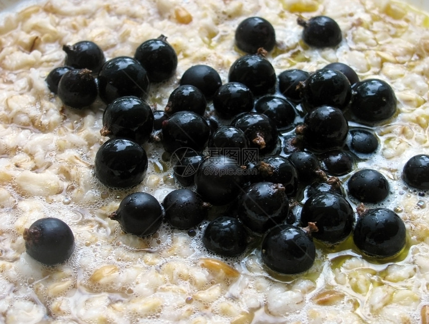 燕麦粥粥稀饭蜂蜜浆果食物营养盘子黑色图片