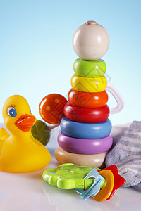 婴儿玩具拨浪鼓新生塑料生活黄色礼物童年乐趣绿色孩子嘈杂高清图片素材