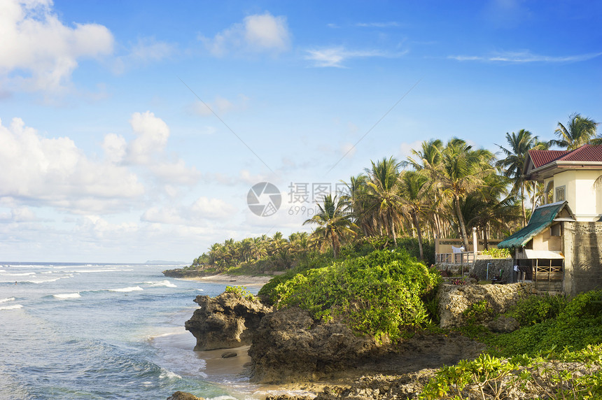 热带热带度假胜地气候情调岩石木头房子场景天空蓝色小屋异国图片