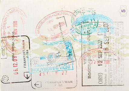 贴有移民邮票的护照页旅行高清图片素材