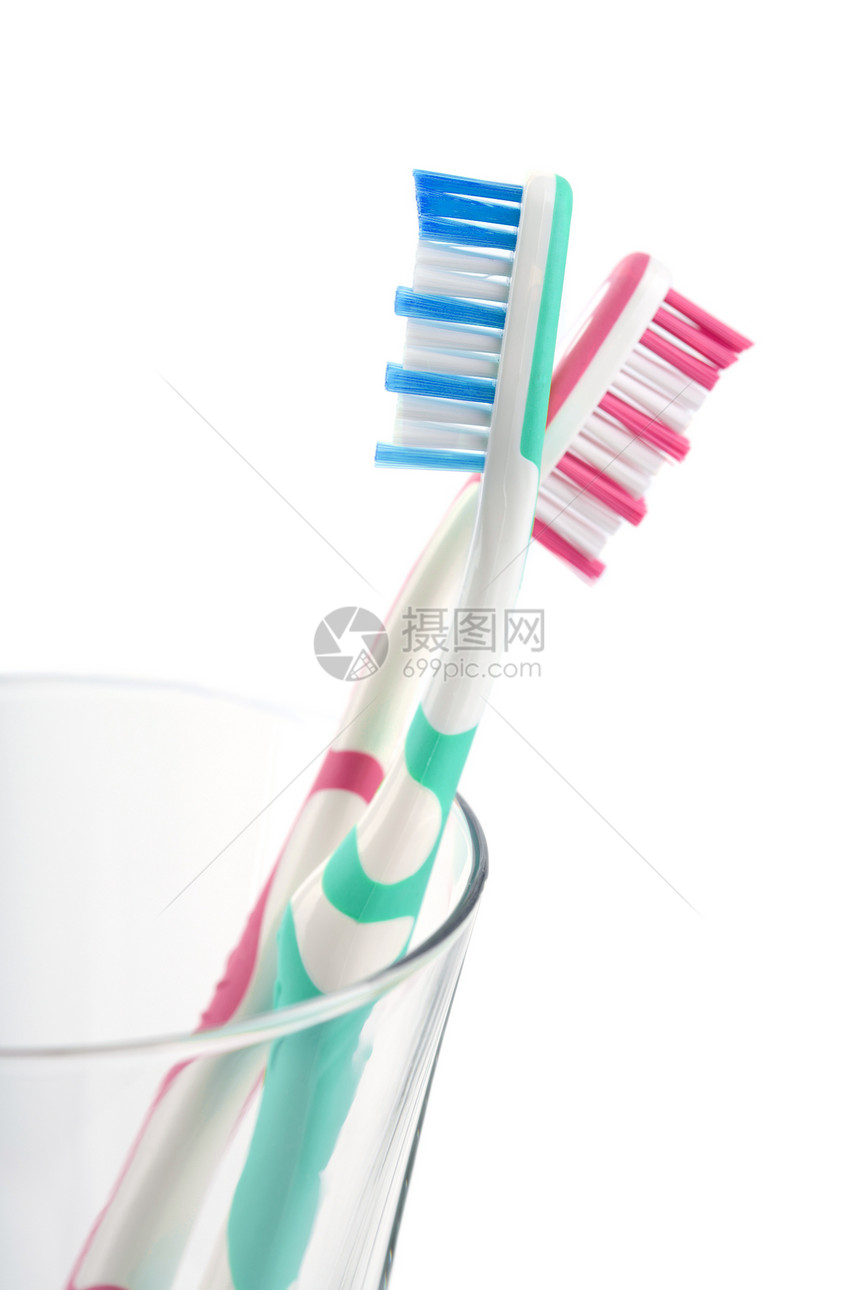 隔离了两个彩色牙刷牙齿玻璃矫正抛光牙医刷子诊所白色盆地药品图片