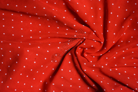 波尔卡圆点圆点织物材料缝纫红色背景