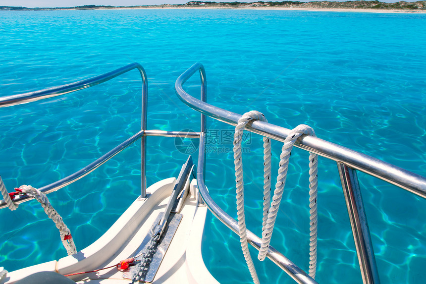 Formentera岛重要海滩上的船胰岛太阳血管栏杆海岸旅行巡航天空热带游艇图片