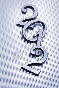 2012年新年静物字母数字金属蓝色背景图片