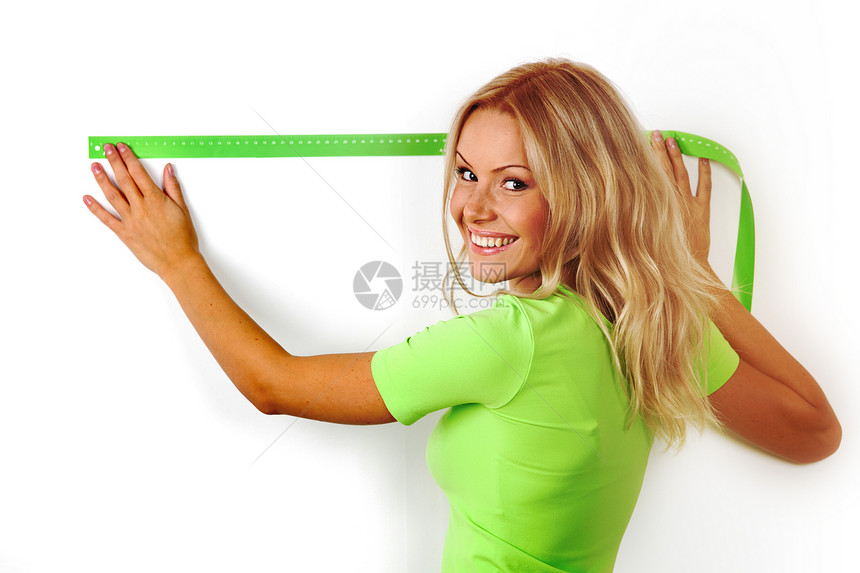 墙壁的长度工具木匠饮食女孩直尺运动服务工人工作身体图片