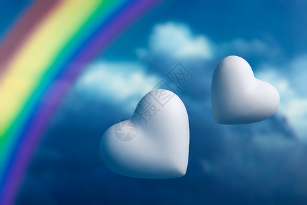 两颗心和彩虹 与蓝天相对高清图片