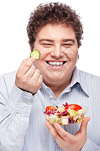 有新鲜沙拉的胖胖男人展示重量饮食白色男性食物高清图片