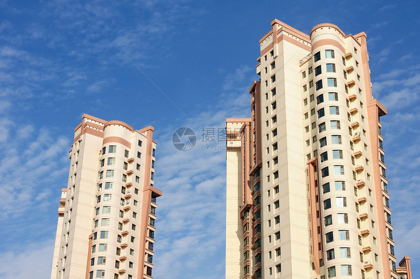 公寓楼城市住宅建造玻璃建筑学蓝色摩天大楼财产窗户天空图片