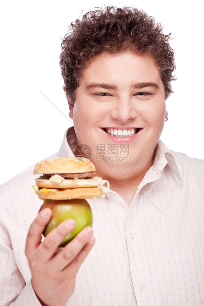 胖胖男人拿着苹果和汉堡包水果午餐脂肪面包热量饥饿美食晚餐重量食欲图片