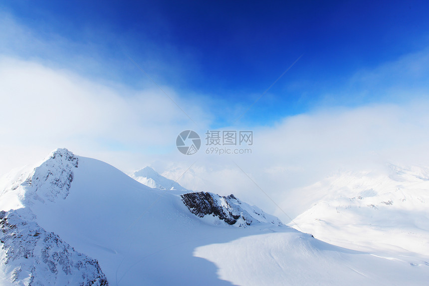 平面顶部岩石高山冻结天空全景旅游滑雪运动旅行单板图片