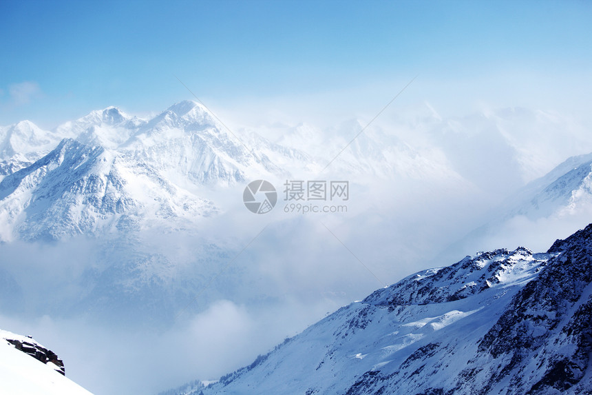 平面顶部顶峰旅游季节岩石冰川冻结天空旅行远足太阳图片