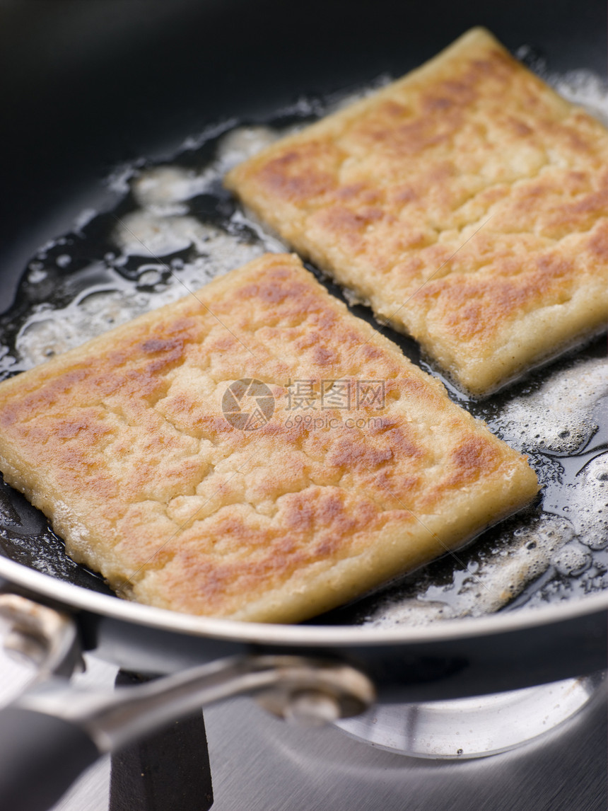 黄油炸土薯条食物奶制品蔬菜早餐马铃薯黄油厨艺土豆乳制品油炸图片