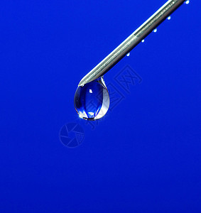 注射针筒蓝色宏观注射器药品背景图片
