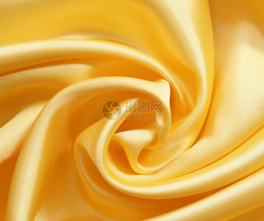 平滑优雅的金金丝绸黄色纺织品折痕海浪曲线布料材料丝绸涟漪投标图片