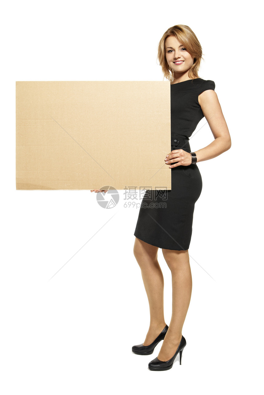 具有吸引力的女性持有空标牌  孤立魅力金发广告牌露齿快乐幸福标语裙子影棚靴子图片