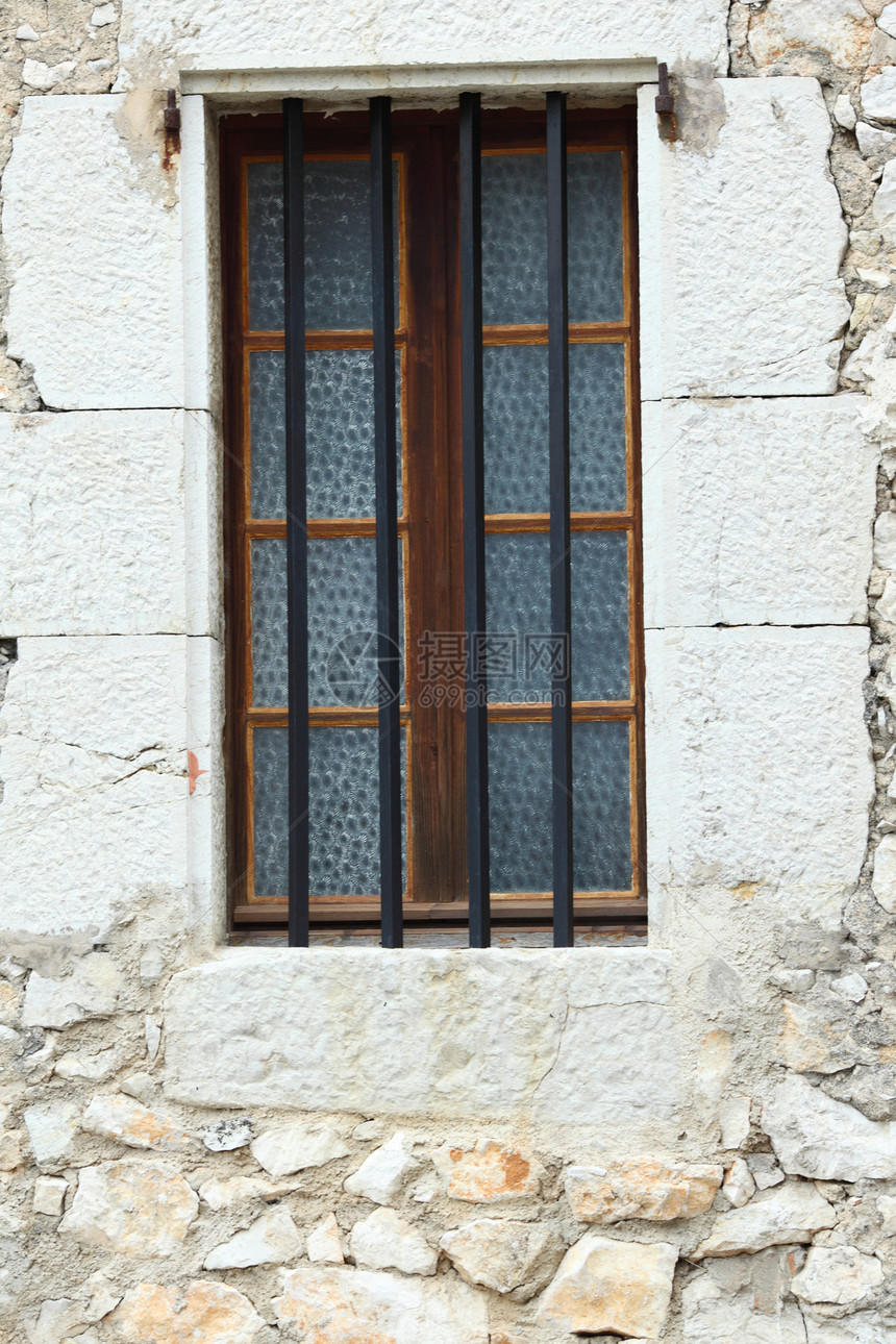 墙上的旧窗口建筑学古董财产风化房东橙子反射废墟石头历史图片