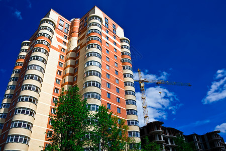 蓝色砖纹背景高楼金属建筑学生活摩天大楼房子住房城市天空反射窗户背景