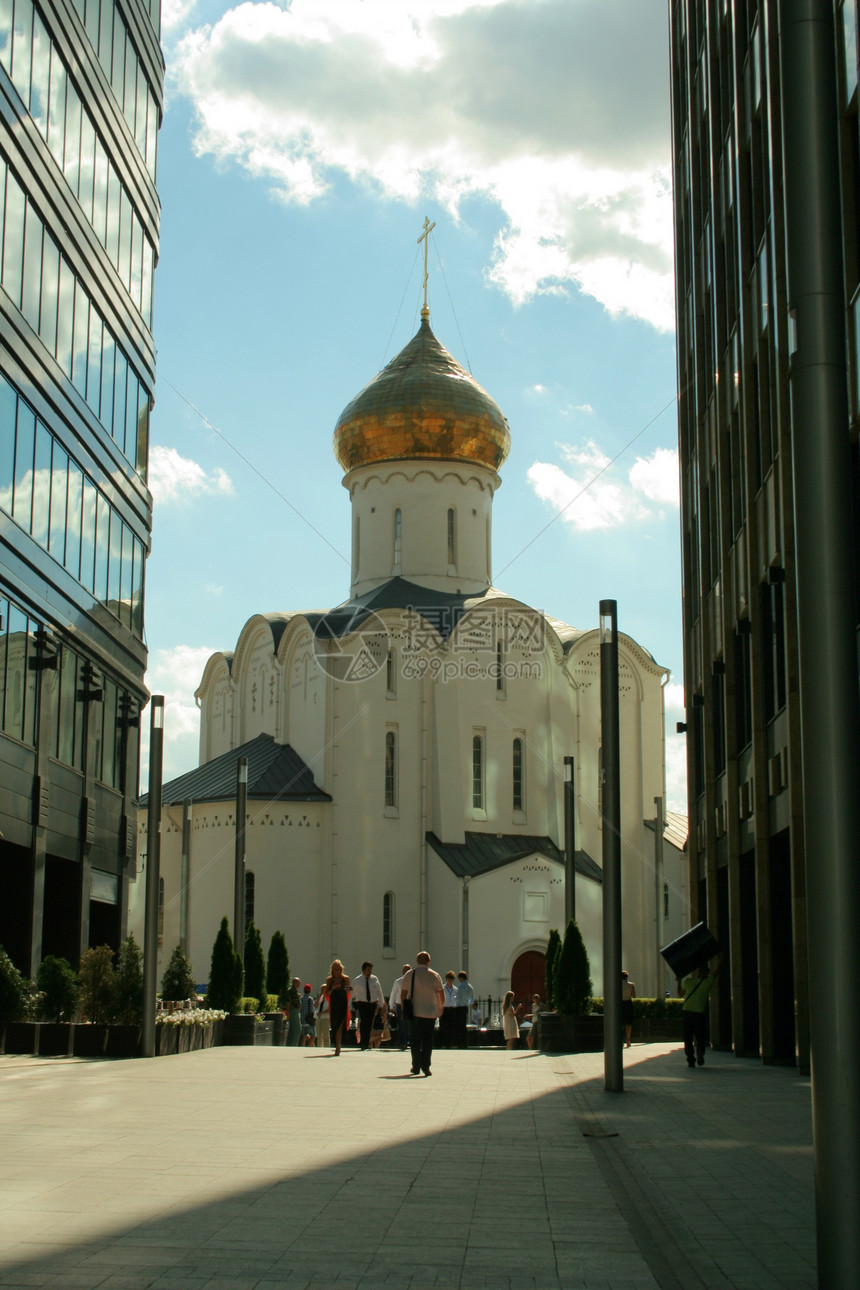 玻璃和混凝土基督教教堂金子遗产城市教会蓝色宗教街道地标阳光历史性图片