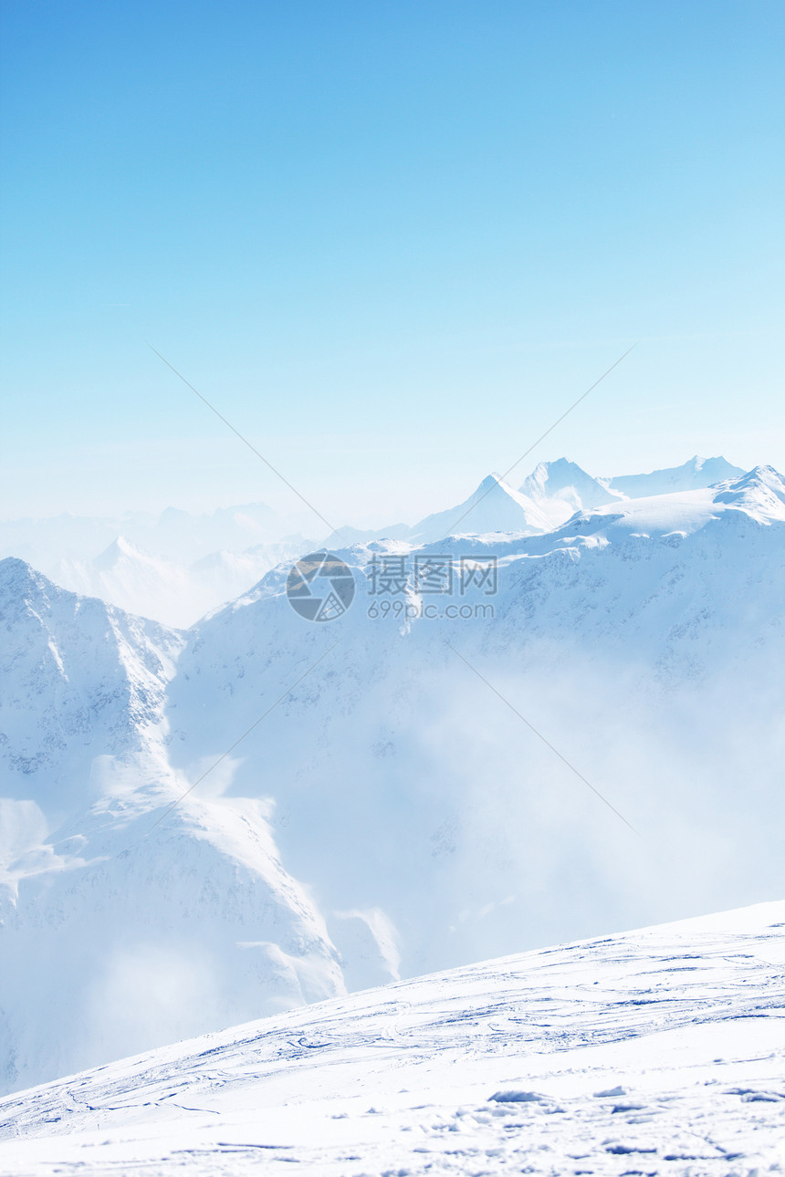 平面顶部太阳阳光旅游单板暴风雪蓝色运动滑雪天空冰川图片