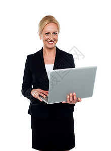 拥有膝上型电脑的公司妇女网络员工工作数据秘书企业家技术商业快乐老板女性高清图片素材