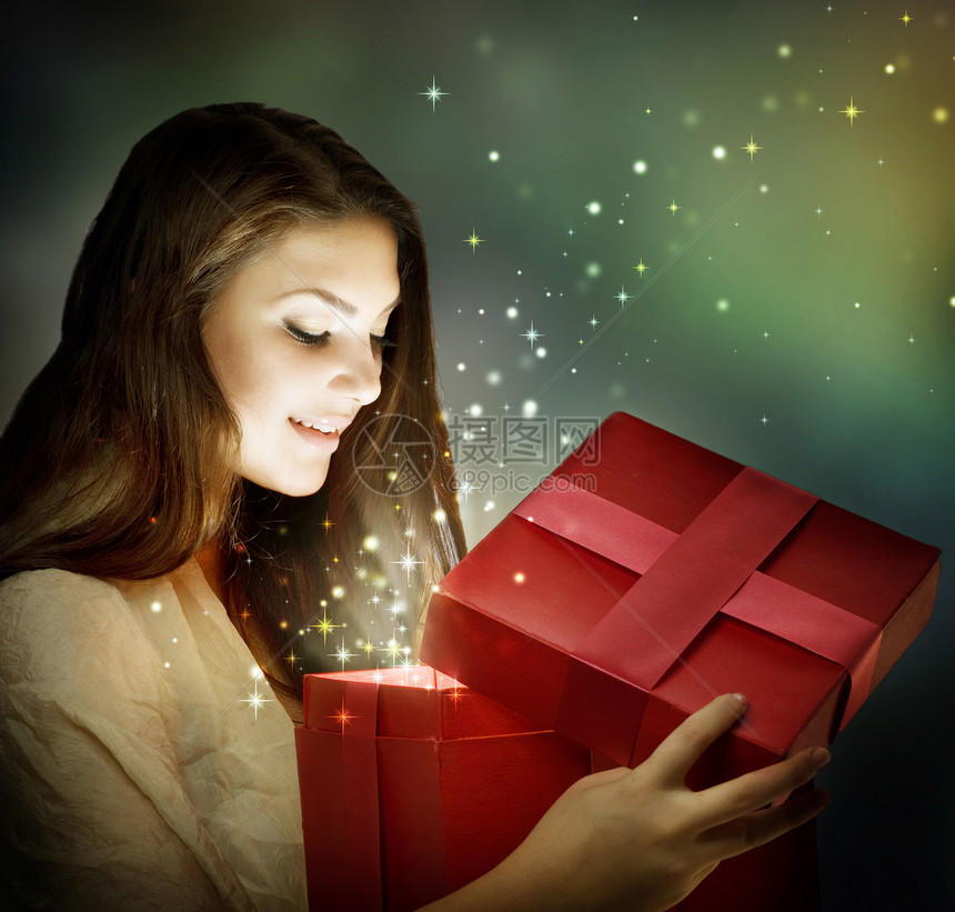 圣诞礼物惊喜女孩礼物星星情绪运动美丽微笑幸福女性图片